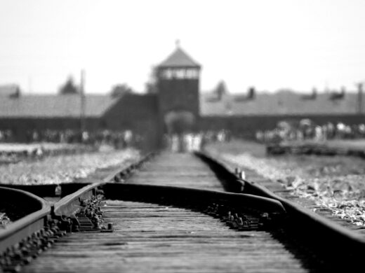 train tracks looking toward building